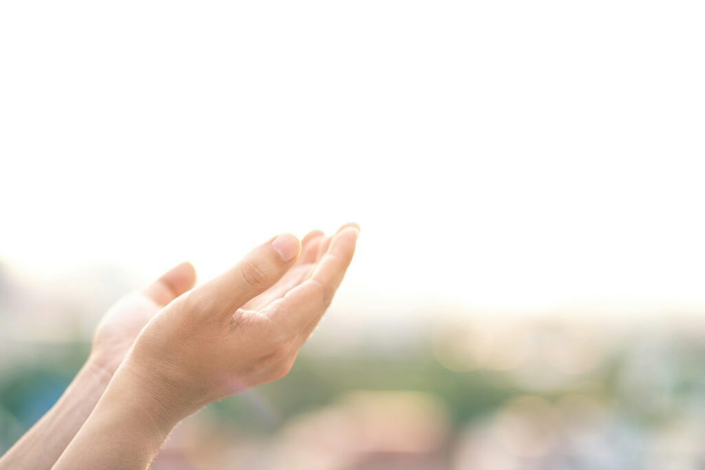 Human hands open palm up worship. Eucharist Therapy Bless God Helping Repent Catholic Easter