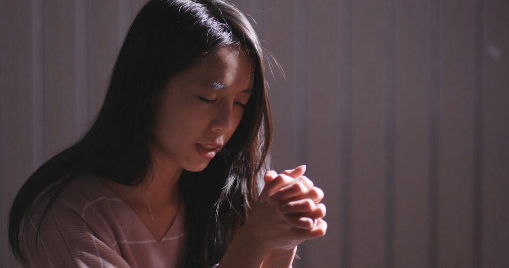 Woman pray for the god